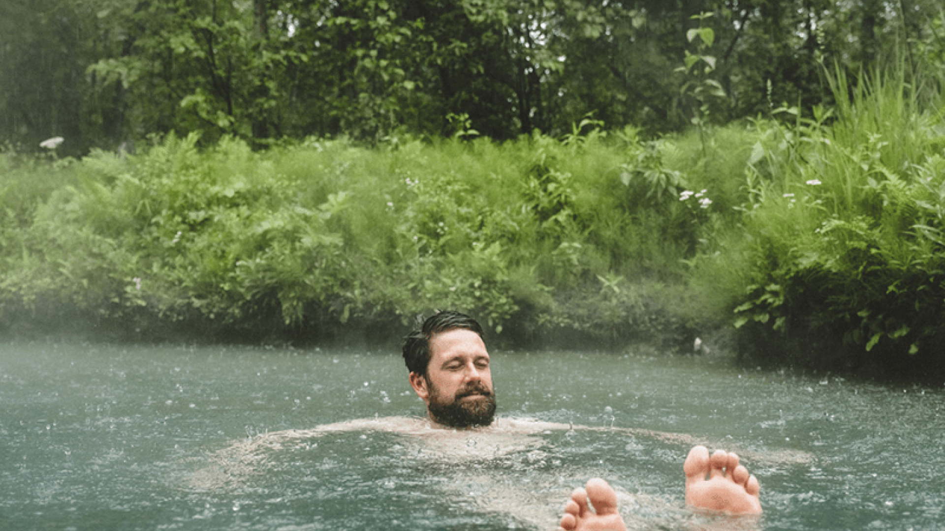 man in hot springs