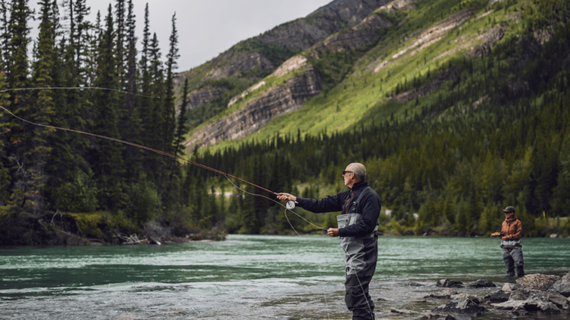 man fishing in river