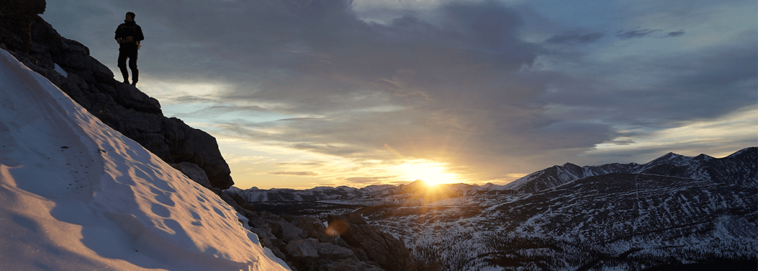 winter hiking with sunset